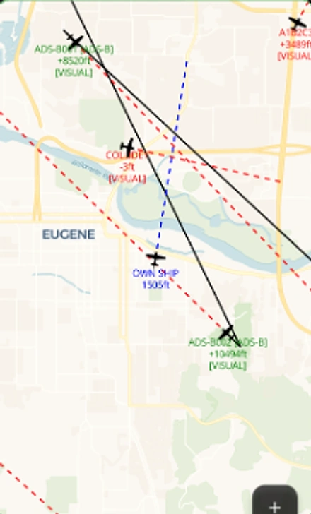 Atlas traffic display showing own-ship and surrounding aircraft on a moving map.